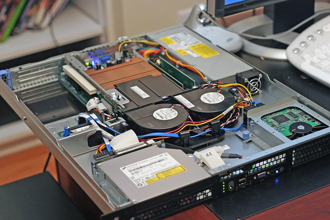 A picture of a 1U rackmount server with the top removed, exposing the internal components